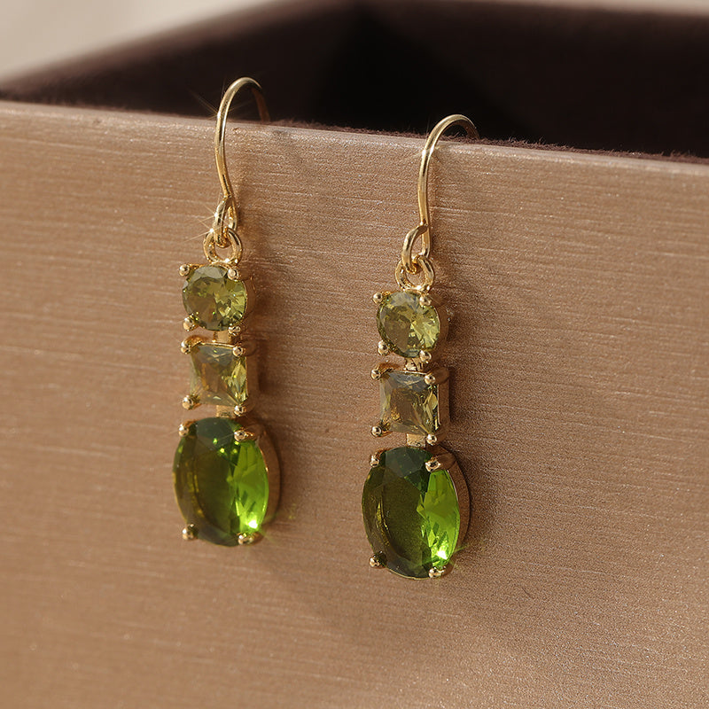 Regal Emerald-Tone Three-Stone Dangles