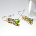 Regal Emerald-Tone Three-Stone Dangles