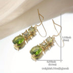 Regal Emerald-Tone Three-Stone Dangles