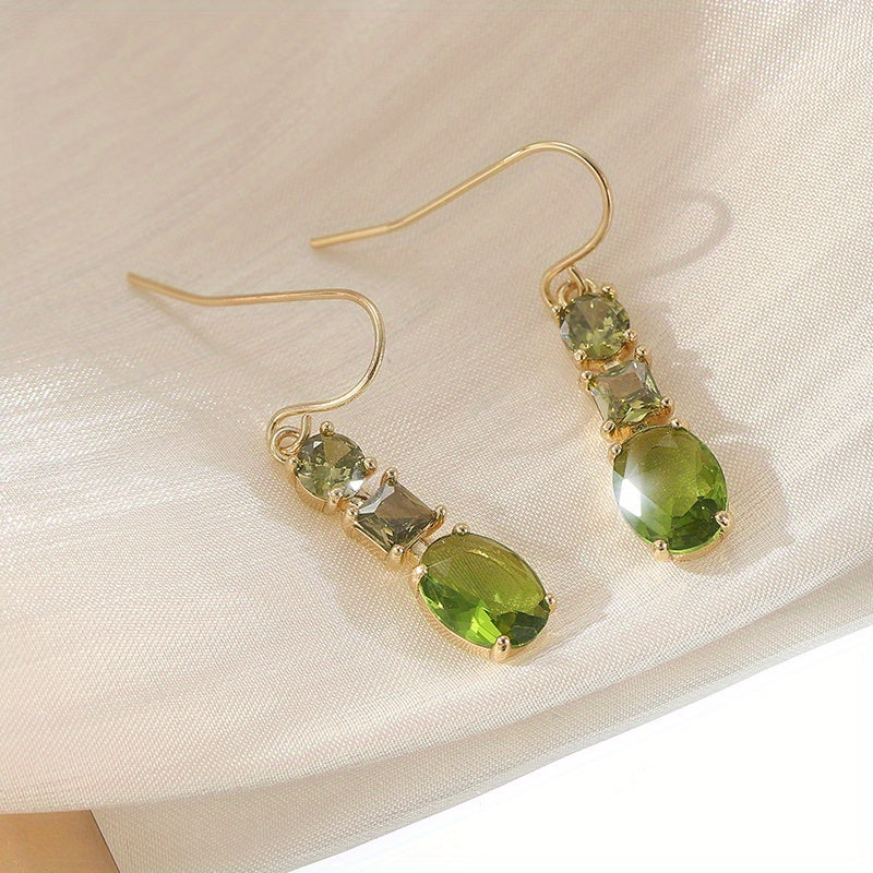 Regal Emerald-Tone Three-Stone Dangles