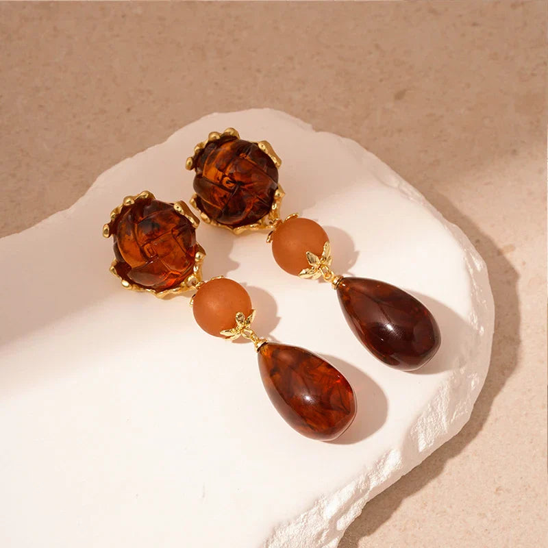 Zhyra - Liquid Metal Teardrop Earrings