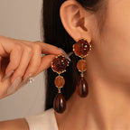 Zhyra - Liquid Metal Teardrop Earrings